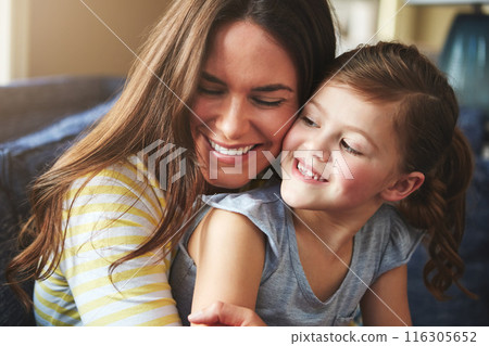 Smile, woman and child hug or love on sofa for trust, bonding and support of relationship moment. Happy, mother and girl as family for care, security or relax with embrace on couch for childhood Smile, woman and child hug or love on sofa for trust, bonding and support of relationship moment. Happy, mother and girl as family for care, security or relax with embrace on couch for childhood 116305652