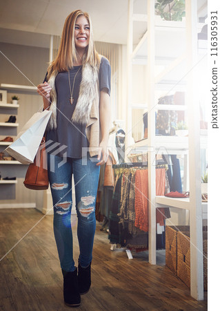 Woman, happy and shopping mall for retail fashion package as customer, commerce or luxury products as discount sale. Smile, female client and paper bag of clothes as designer brand in Paris holiday 116305931