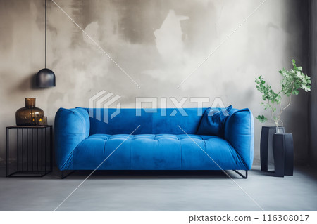 Luxurious blue velvet sofa in Modern Living Space on empty concrete wall background Luxurious blue velvet sofa in Modern Living Space on empty concrete wall background 116308017