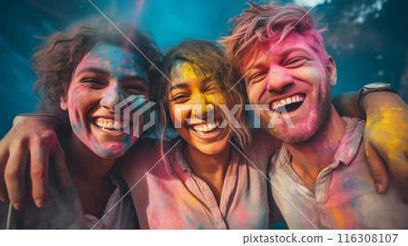 Joyful group of friends with colorful faces celebrating Holi festival of colors 116308107