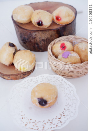 flavored ball donuts as a background 116308351