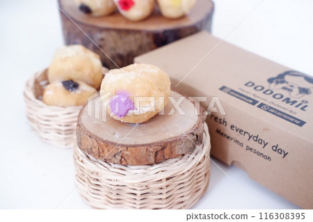flavored ball donuts as a background flavored ball donuts as a background 116308395