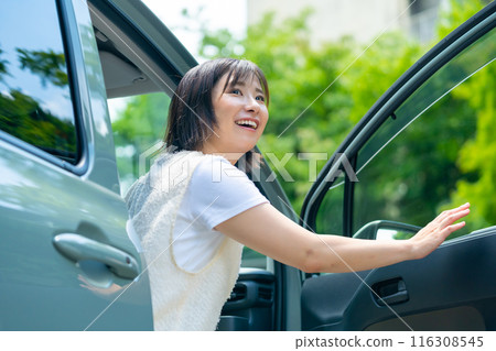 A woman on a road trip, a woman traveling, a woman enjoying her holiday 116308545