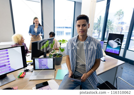 Colleagues in business collaborating on a startup in a modern office, copy space Colleagues in business collaborating on a startup in a modern office, copy space 116310062
