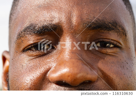 Close-up of person's face, difficult to describe context of hydroponic farm shoot 116310630
