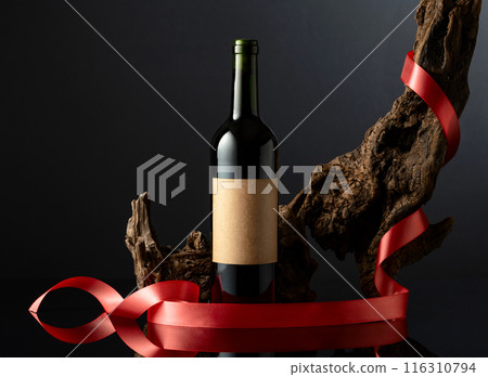 Bottle of red wine with old empty label. Bottle of red wine with old empty label. 116310794