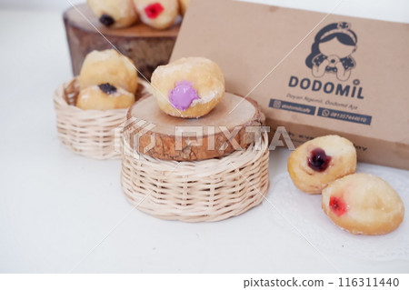 flavored ball donuts as a background flavored ball donuts as a background 116311440