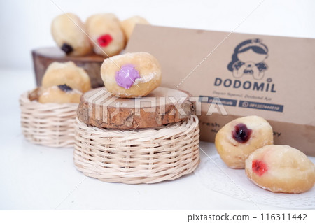 flavored ball donuts as a background 116311442