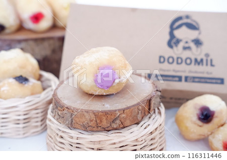 flavored ball donuts as a background flavored ball donuts as a background 116311446