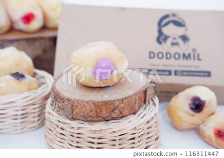 flavored ball donuts as a background 116311447