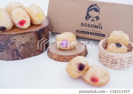 flavored ball donuts as a background flavored ball donuts as a background 116311457