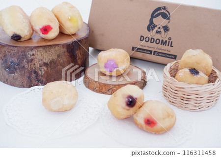 flavored ball donuts as a background flavored ball donuts as a background 116311458