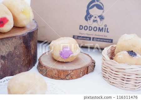 flavored ball donuts as a background 116311476