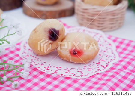 flavored ball donuts as a background 116311483
