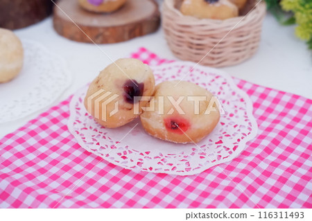 flavored ball donuts as a background 116311493