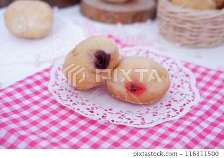 flavored ball donuts as a background flavored ball donuts as a background 116311500