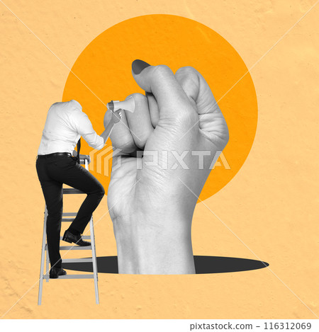 A businessman holding a megaphone with a raised hand in the air 116312069