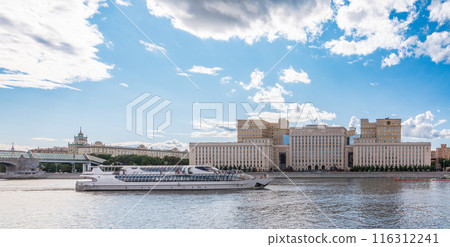 View of the Ministry of Defence of Russian Federation, and Moscow river embakment with cruise ships at sunset. View of the Ministry of Defence of Russian Federation, and Moscow river embakment with cruise ships at sunset. 116312241