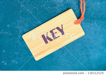 The word key on a card with a string 116312529