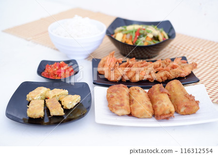 Indonesian food. lunch menu, rice with shrimp and side dishes Indonesian food. lunch menu, rice with shrimp and side dishes 116312554