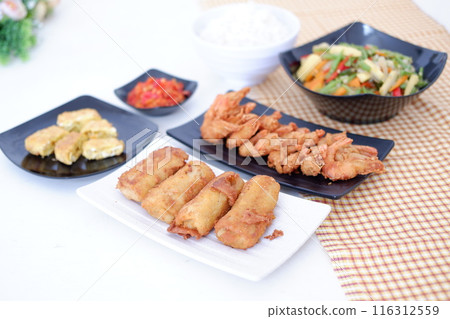 Indonesian food. lunch menu, rice with shrimp and side dishes Indonesian food. lunch menu, rice with shrimp and side dishes 116312559