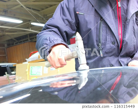 Putty filling and finishing work at an automobile body repair and painting factory 05 Putty filling and finishing work at an automobile body repair and painting factory 05 116315449