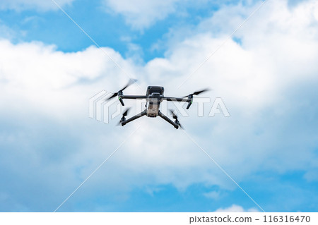 Drone flying Drone flying 116316470