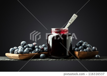 Blueberry jam and fresh berries. 116316537