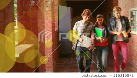Image of yellow circles floating over caucasian female and male teenagers on school corridor Image of yellow circles floating over caucasian female and male teenagers on school corridor 116316871