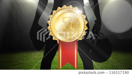 Image of gold medal over silhouette of male baseball player 116317190
