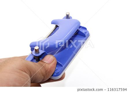 A picture of paper punching machine on white background A picture of paper punching machine on white background 116317594