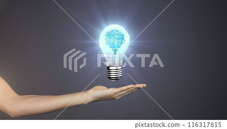 Image of hand with lightbulb with brain on gray background 116317815