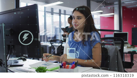 Image of financial data processing over caucasian businesswoman using computer at office Image of financial data processing over caucasian businesswoman using computer at office 116318319
