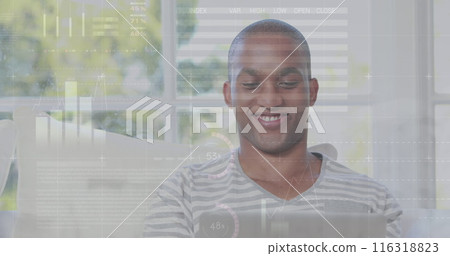Image of infographic interface over smiling african american man using laptop at home 116318823