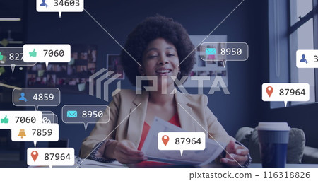 Image of notification icons over african american businesswoman discussing over image call Image of notification icons over african american businesswoman discussing over image call 116318826