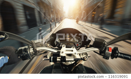 Motorcyclist's perspective speed through sunlit urban street, capturing the thrill and rush of navigating city roads on a motorcycle. Motorcyclist's perspective speed through sunlit urban street, capturing the thrill and rush of navigating city roads on a motorcycle. 116319091