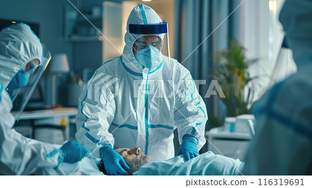 Medical Team Treating Patient in Protective Gear 116319691