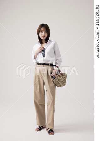 a Korean woman wearing a white shirt and sunglasses a Korean woman wearing a white shirt and sunglasses 116320383