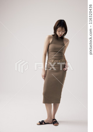 Korean Woman Poses in Beige Knit Dress Korean Woman Poses in Beige Knit Dress 116320436