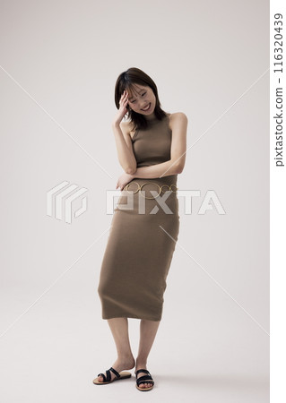 Korean Woman Poses in Knit Dress 116320439