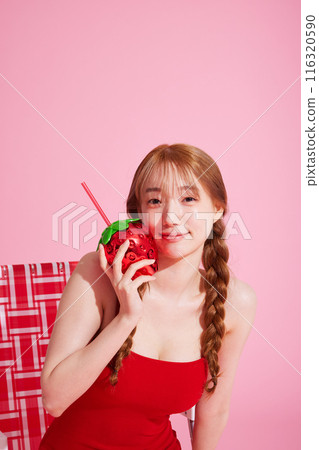 A Korean woman in her 20s wearing a monokini look with a pink background 116320590