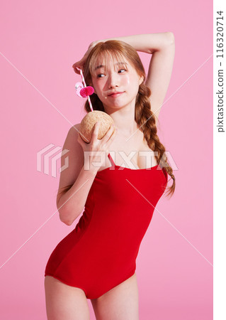 Korean Woman in Her 20s Poses With Coconut Drinks in Monokini Look Korean Woman in Her 20s Poses With Coconut Drinks in Monokini Look 116320714