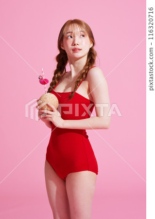 Korean Woman in Her 20s Poses With Coconut Drinks in Monokini Look Korean Woman in Her 20s Poses With Coconut Drinks in Monokini Look 116320716