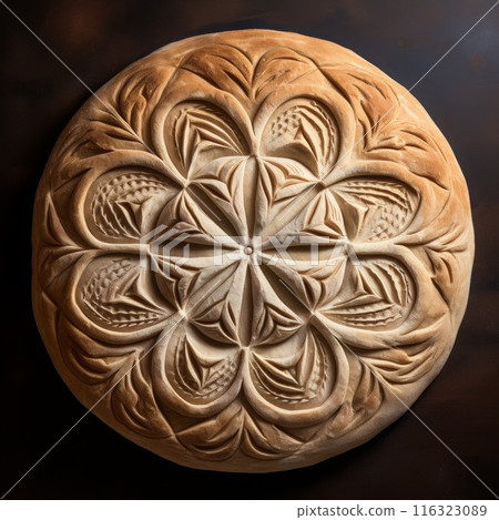 Freshly Baked Round Bread with Golden Crust for Sandwiches, Toast, or as a Side to Soup, Salad 116323089