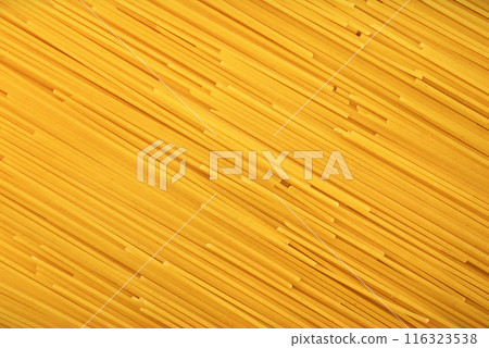 Raw spaghetti close-up. Spaghetti background texture Raw spaghetti close-up. Spaghetti background texture 116323538