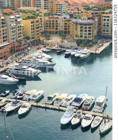 Structures and buildings, sea and yachts of Monaco. Summer and tourism, vacation. Background, landscape for design. Structures and buildings, sea and yachts of Monaco. Summer and tourism, vacation. Background, landscape for design. 116324759