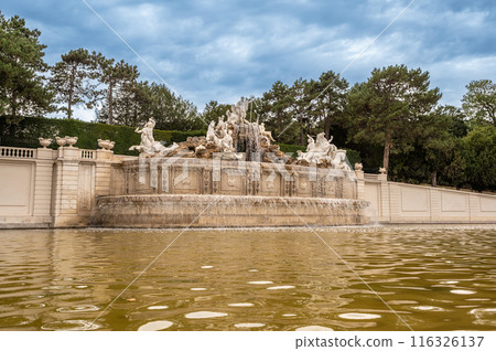 Vienna, Austria, August 20, 2022. The Neptune Fountain, in the gardens of Schonbrunn Palace. No people, copy space. Vienna, Austria, August 20, 2022. The Neptune Fountain, in the gardens of Schonbrunn Palace. No people, copy space. 116326137