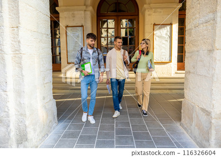Students walking in university campus during break 116326604