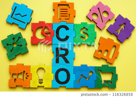 Colored puzzle with abbreviation CRO Conversion Rate Optimization. Colored puzzle with abbreviation CRO Conversion Rate Optimization. 116326858