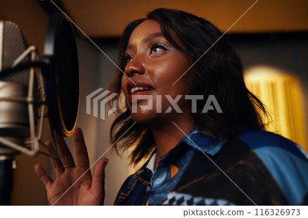 African American Singer Recording Song African American Singer Recording Song 116326973